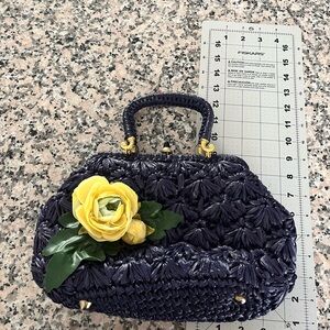 Vintage Navy Blue Woven Handbag with Yellow Flower Accent